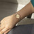 Anne Klein Women's AK/2434RGRG Diamond-Accented Rose Gold-Tone Bracelet Watch